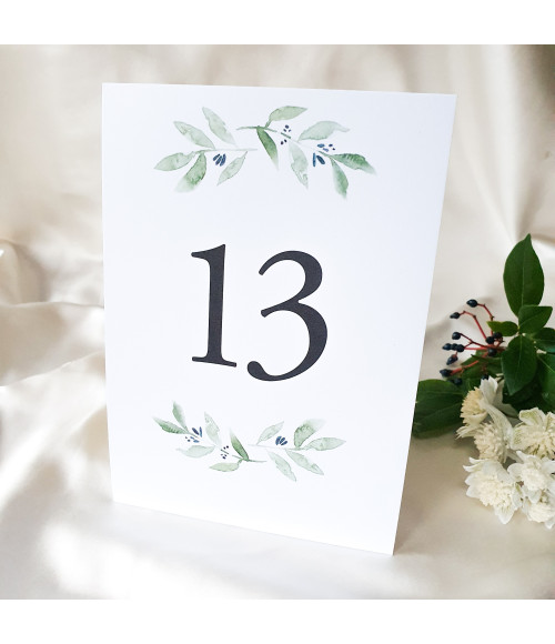 Complete wedding stationery sample collection featuring olive leaf wedding invitations