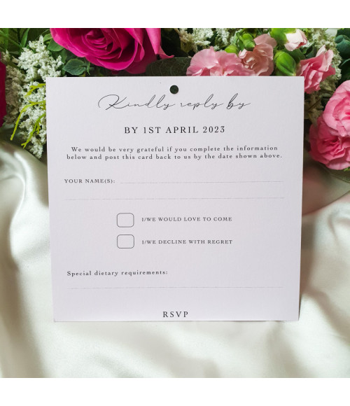 Luxury wedding invite details with smooth finish and romantic pink tones