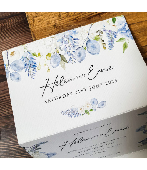 Personalised dusty blue wedding invitation with a convenient tear-off RSVP postcard for guests.