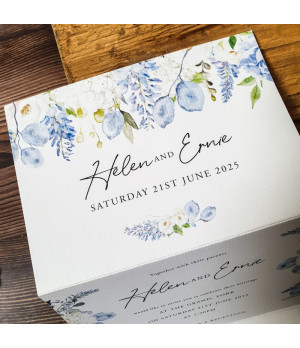 Personalised dusty blue wedding invitation with a convenient tear-off RSVP postcard for guests.