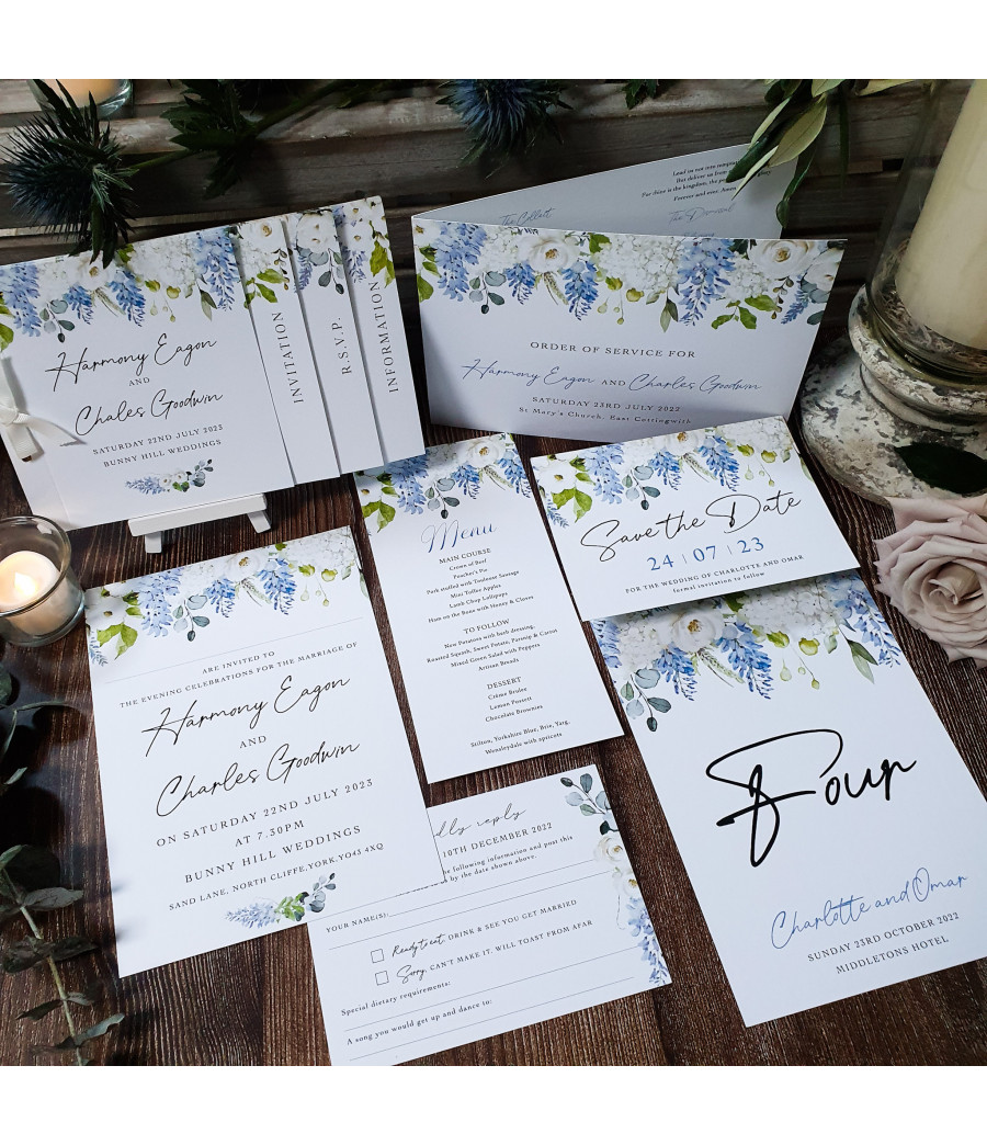 Dusty blue floral wedding stationery featuring Save the Date invitation Order of Service menu place name card and table name.