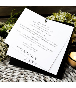 Elegant monochrome wedding stationery suite featuring RSVP and information cards