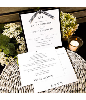 Modern black wedding invitation with striped ribbon fastening and luxury finish