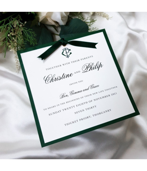 Luxury forest green evening wedding invitation with satin ribbon and personalised monogram design