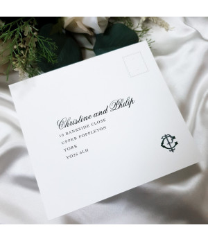 Personalised forest green wedding invitation suite with monogram initials and refined finish