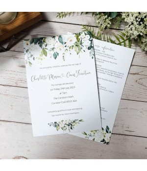 Luxury botanical wedding stationery sample with delicate white roses and greenery.