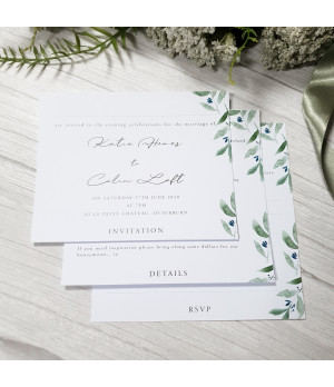 Luxury white wedding invitation with olive leaf foliage and satin ribbon