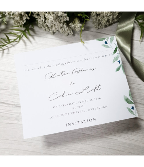Classic botanical wedding invite with soft greenery and elegant design