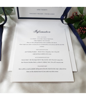 Sophisticated UK wedding invitation design with navy theme, monogram initials, and luxury finish