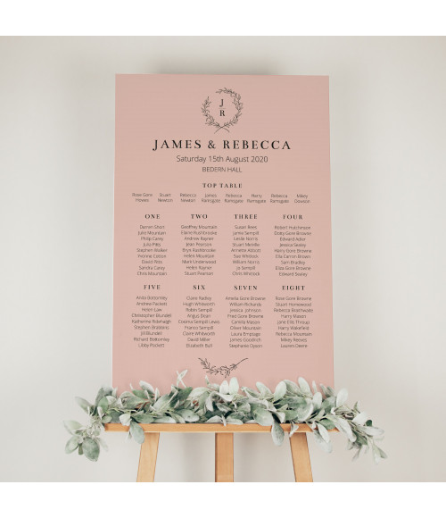 Blush floral wedding table plan with personalised guest seating and elegant wedding reception design