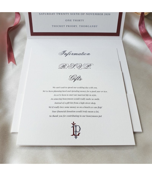 Personalised square wedding invitation in soft dusky pink and pearl white.