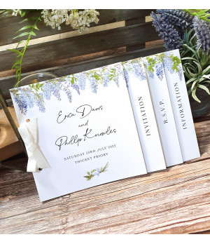 Wisteria wedding invite with white ribbon, floral design and textured card