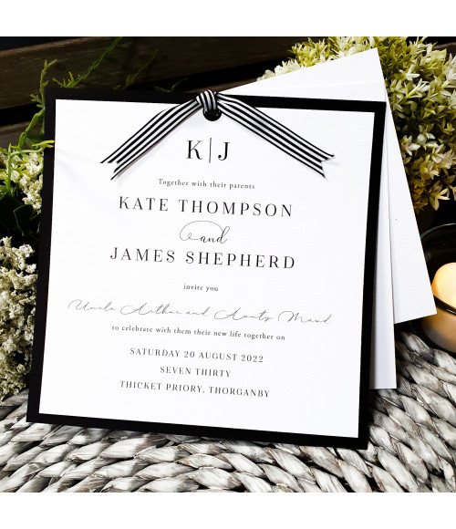 Luxury black evening wedding invitation with striped ribbon and personalised monogram design
