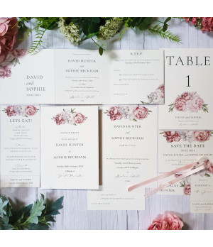 Elegant pink peony wedding stationery menu featuring romantic floral details