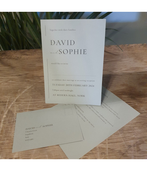 Elegant sage green evening wedding invitation with modern typography and luxury card stock.