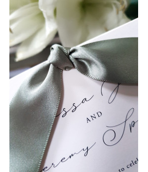 Elegant sage green wedding invitation with luxury pearl card and satin ribbon