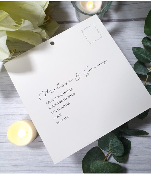 Ivory wedding invitation with satin old rose pink ribbon, complemented by an RSVP postcard and an information card