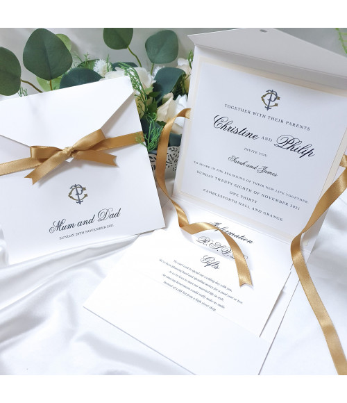Gold wedding invitation suite with RSVP postcard, information card and gift card in a coordinated luxury stationery set