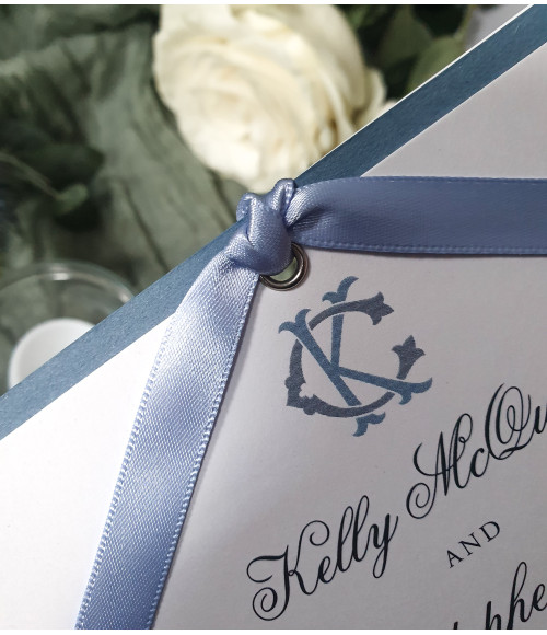 Elegant dusty blue wedding stationery suite featuring RSVP and information cards