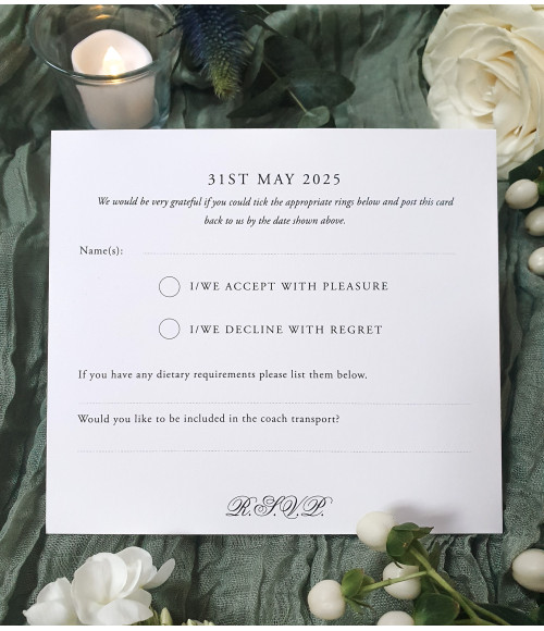 Luxury UK wedding invitation suite in soft blue tones with satin ribbon detail