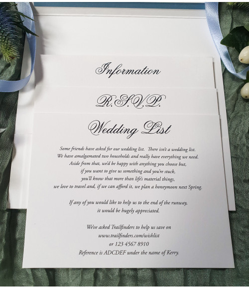Personalised blue grey wedding invitation with custom monogram initials on luxury pearl card in dusty blue theme