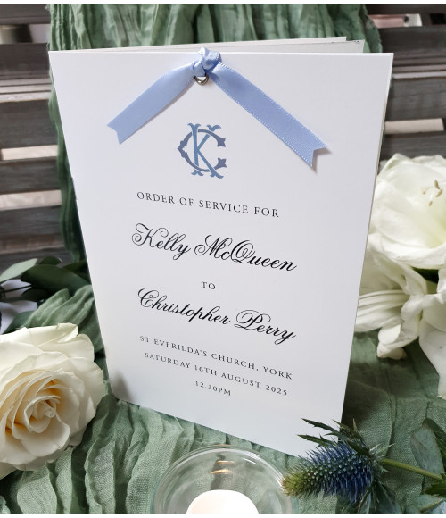 Traditional light blue wedding order of service sheet for a church ceremony
