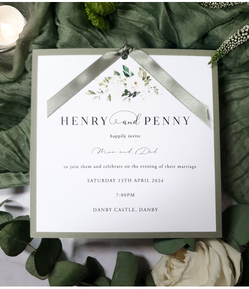 White rose wedding stationery suite featuring RSVP and information cards in premium design