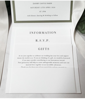 Premium personalised wedding invitation featuring white roses, textured card, and layered stationery set