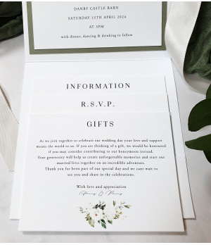Elegant white rose wedding invitation suite tied with luxury satin ribbon and modern calligraphy typography