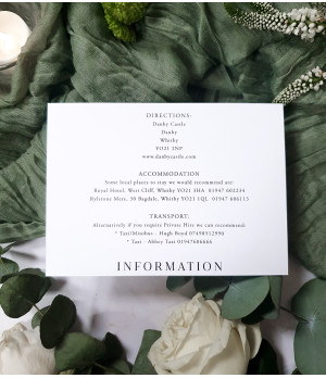 Elegant evening wedding invitation with white floral artwork and modern typography