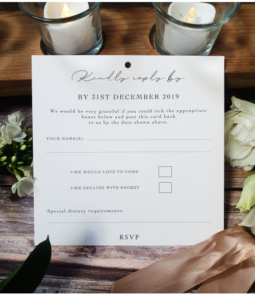Classic ivory wedding invitation with mocha brown ribbon—subtle yet striking, perfect for an elegant, timeless wedding