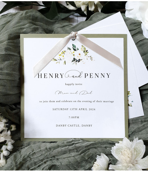 White rose wedding stationery suite featuring RSVP and information cards in premium finish
