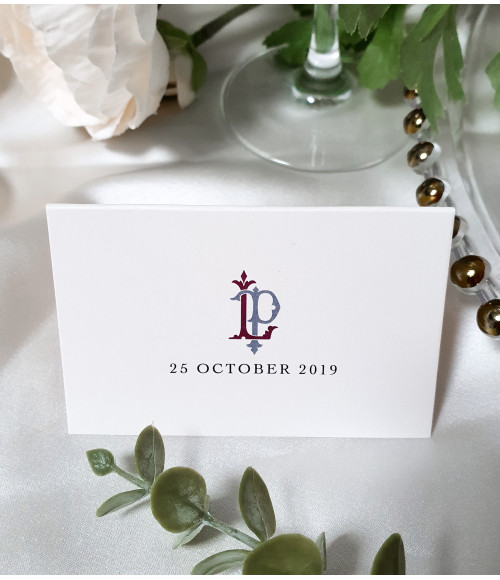 Elegant dusky pink wedding place cards personalised with guest names for a beautifully styled reception table.