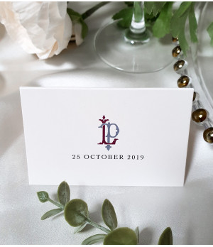 Elegant dusky pink wedding place cards personalised with guest names for a beautifully styled reception table.