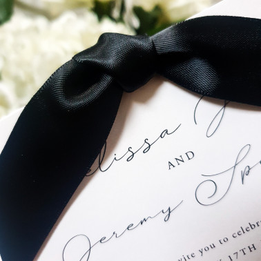 A sophisticated black and Ivory invitation designed for a truly stylish wedding