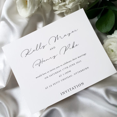 Classic black typography on luxury pearl card wedding invitation