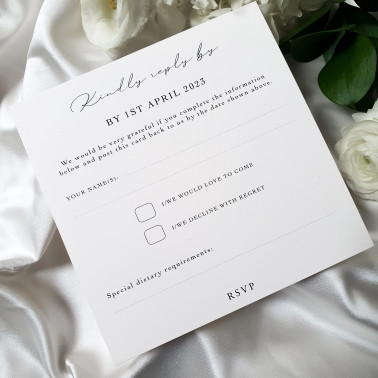 Minimalist black wedding invitation suite with premium card and elegant fonts