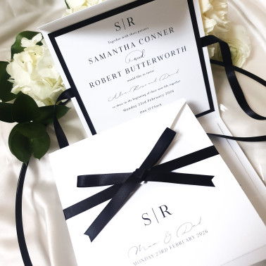 Luxury black wedding invitation suite with elegant monochrome design and personalised details