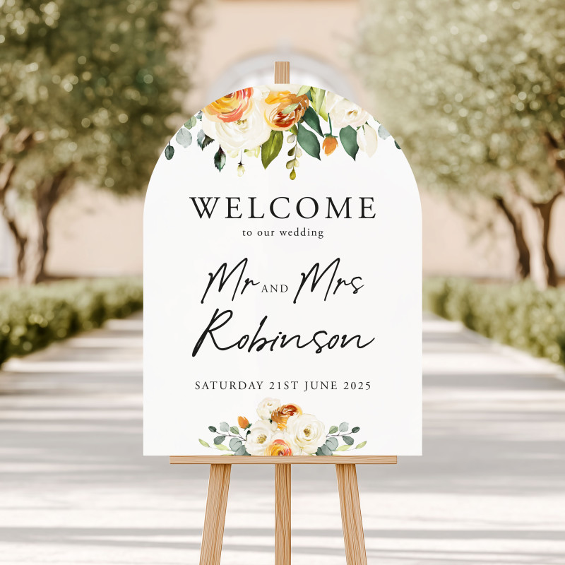 Personalised burnt orange wedding welcome sign featuring elegant neutral florals and modern script lettering.