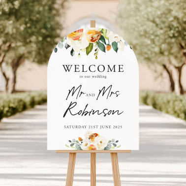 Personalised burnt orange wedding welcome sign featuring elegant neutral florals and modern script lettering.