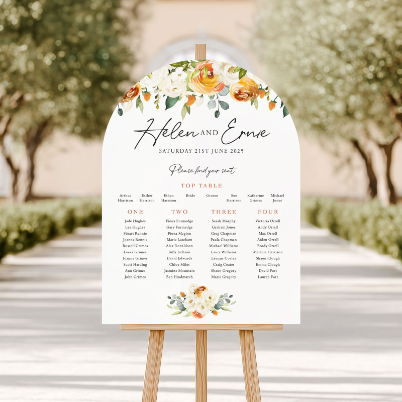 Arched wedding seating plan personalised with the couple’s names, wedding date and guest table arrangements.