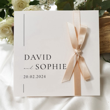 Personalised champagne and beige wedding invitation featuring an elegant neutral colour palette and modern typography.