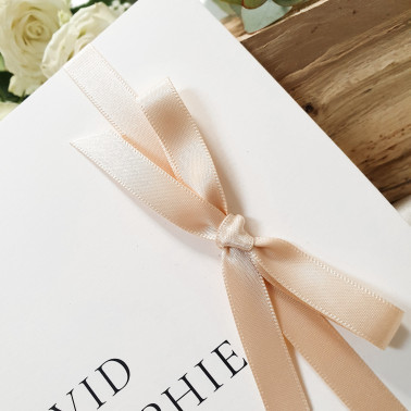 Elegant champagne wedding invite in soft beige and cream shades for a timeless neutral wedding theme.