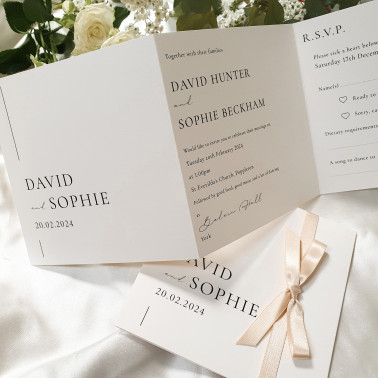 Luxury beige wedding invitation with warm champagne tones, personalised with the couple’s wedding details.