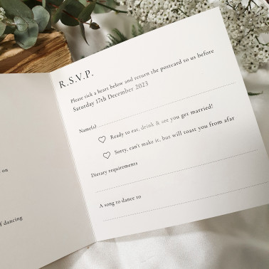 Contemporary beige wedding invite featuring a soft neutral design for a modern minimalist wedding.