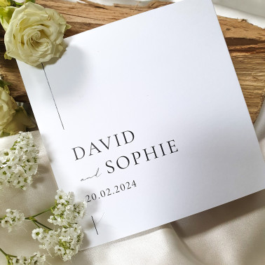 Modern personalised wedding invitation with classic black and white typography.