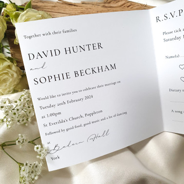 Elegant monochrome wedding invitation printed on premium-quality cardstock.