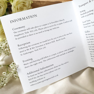 Timeless black and white wedding invitation with elegant modern typography.