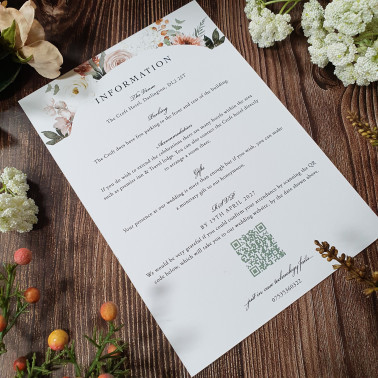 Close-up of a personalised taupe and cream evening wedding invitation with premium printing, elegant fonts and a neutral design.