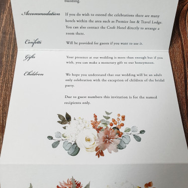 Neutral wedding invitation in taupe and cream with a fold-out design, perfect for elegant UK wedding stationery.
